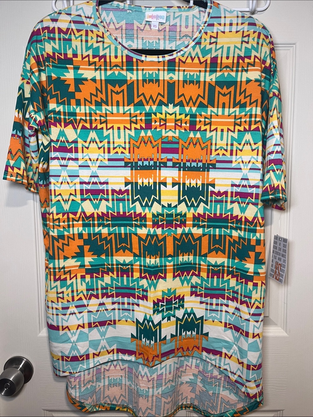 LuLaRoe Irma Tunic Top in Orange, Teal & Yellow Aztec Print